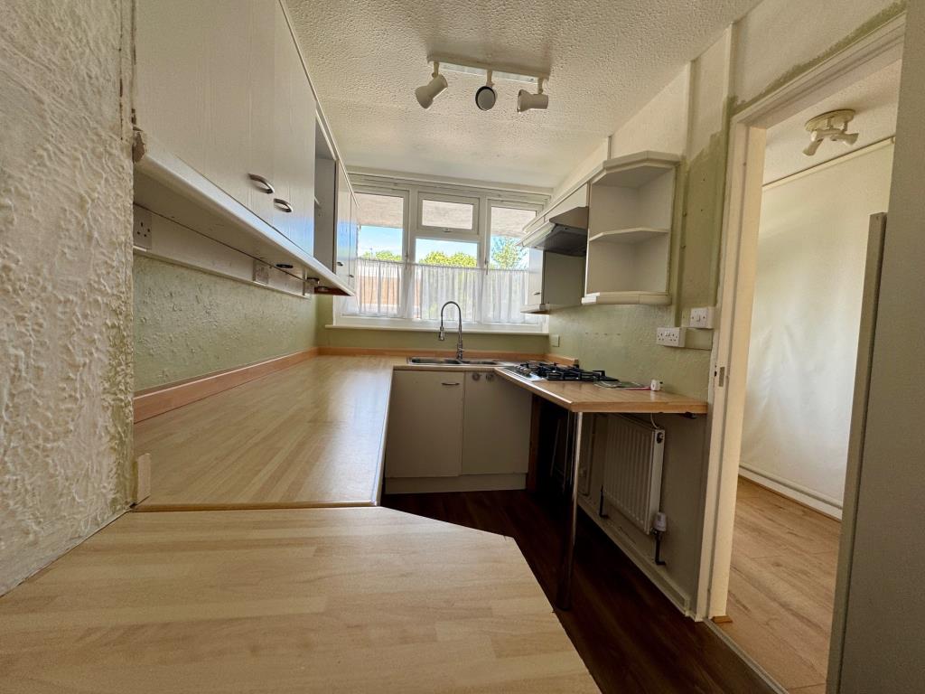 Lot: 113 - TWO-BEDROOM MAISONETTE FOR REDECORATION WITH GARAGE EN-BLOC - Kitchen